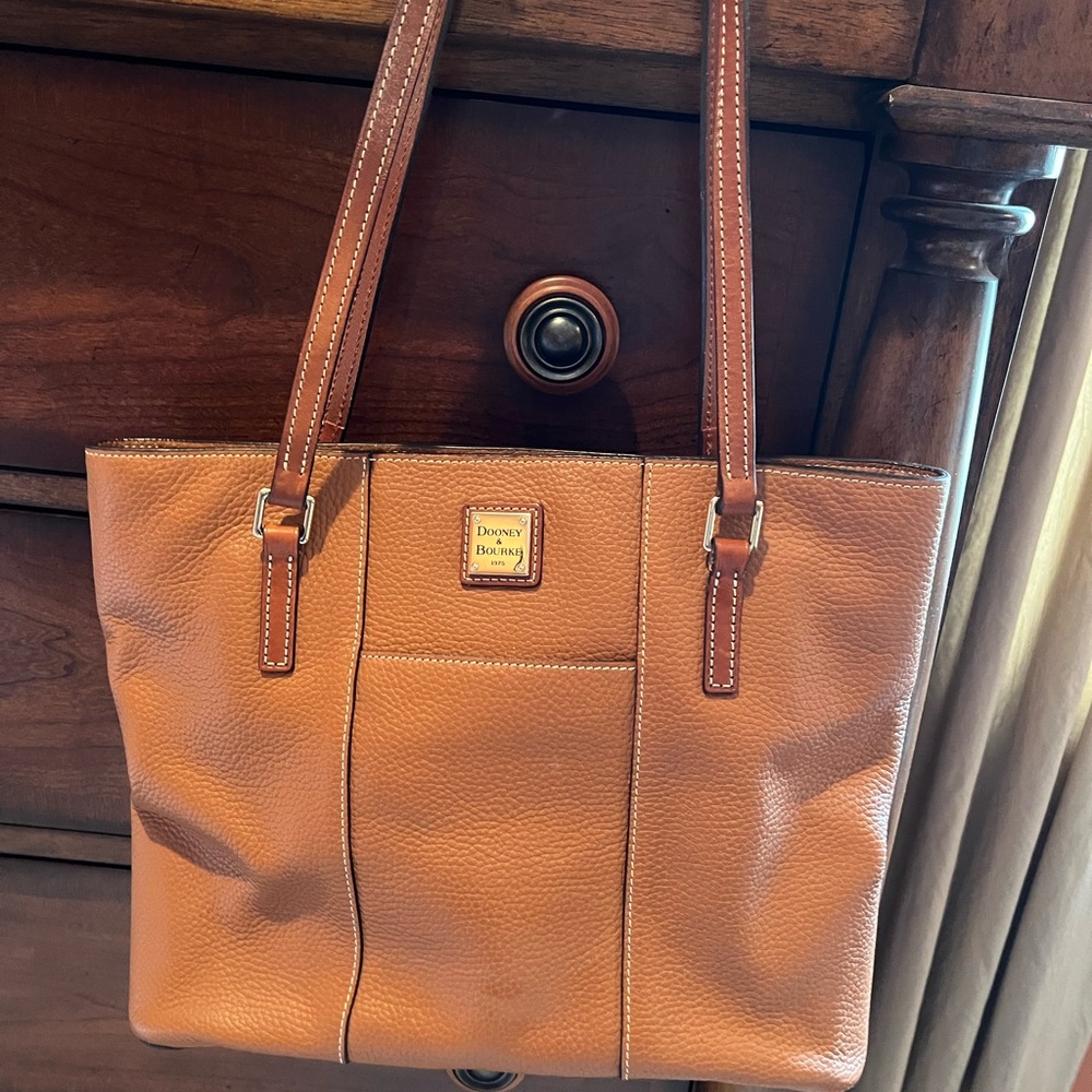 tan dooney and bourke